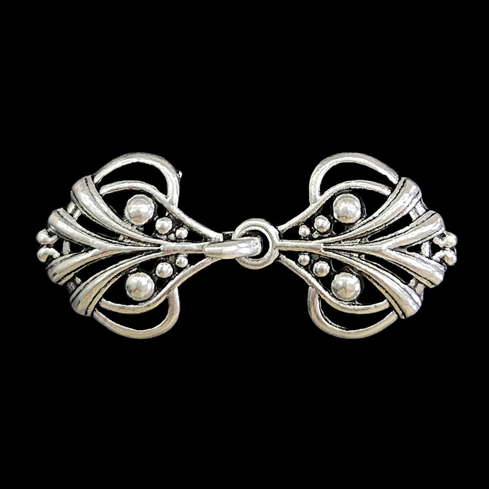 Sew-on brooch for mantle