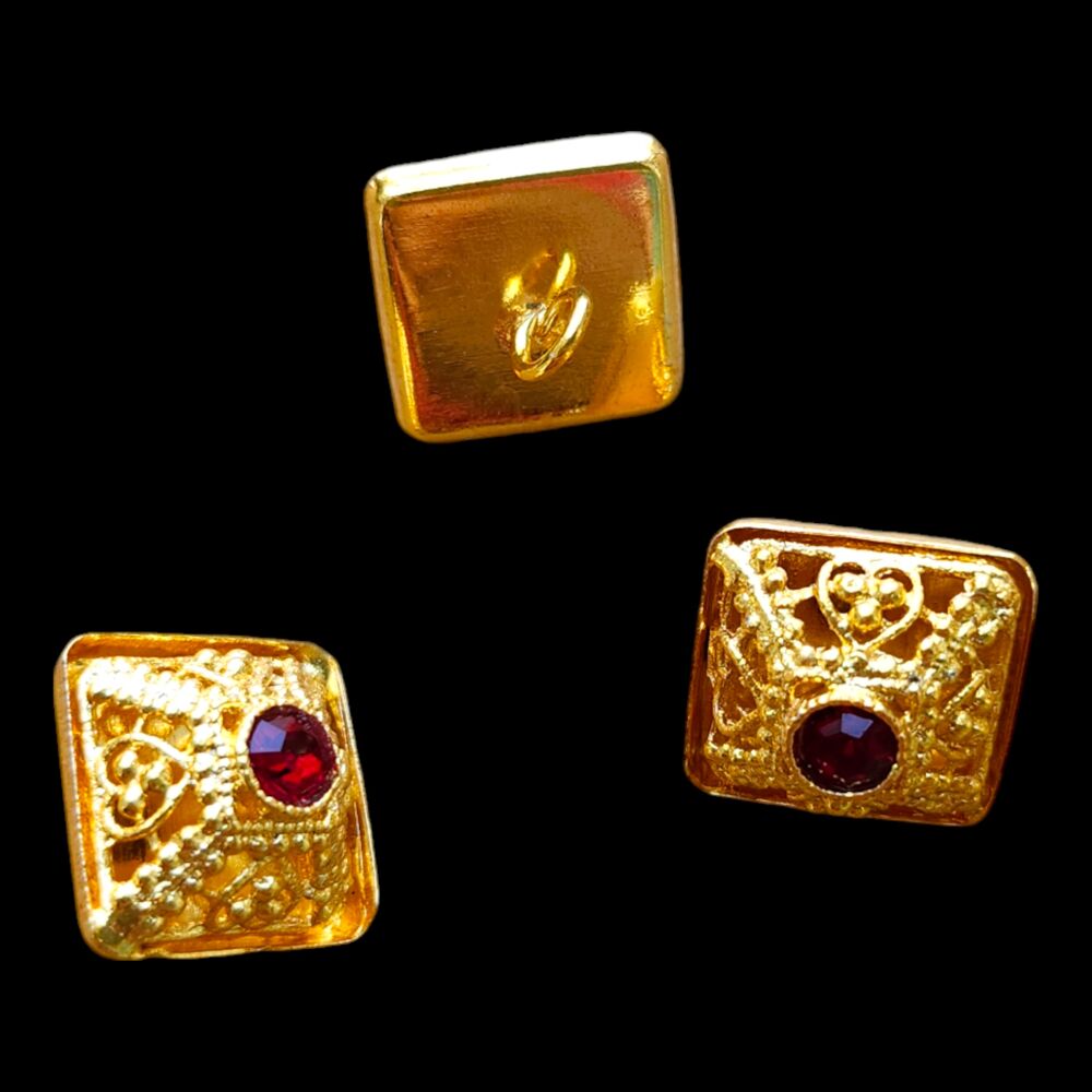Button for bishop's vestments with a burgundy stone